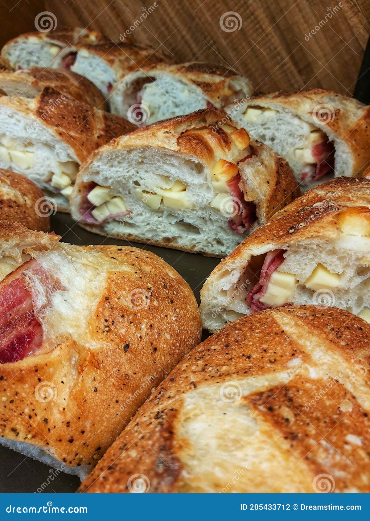 Bread Filled with Meat and Cheese, a Baking Sheet Full Stock Photo