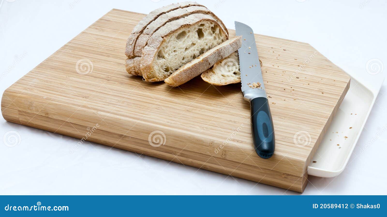 Bread And Knife On A Cutting Board Stock Photo Image of breakfast