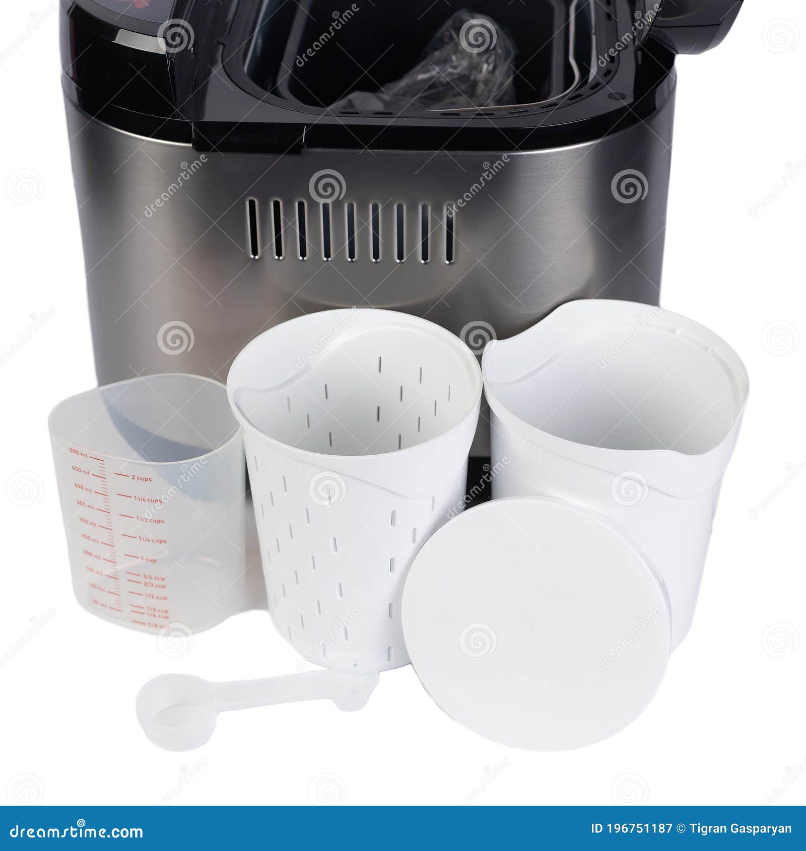 Bread Maker Accessories Isolated on White Background. Plastic Measuring