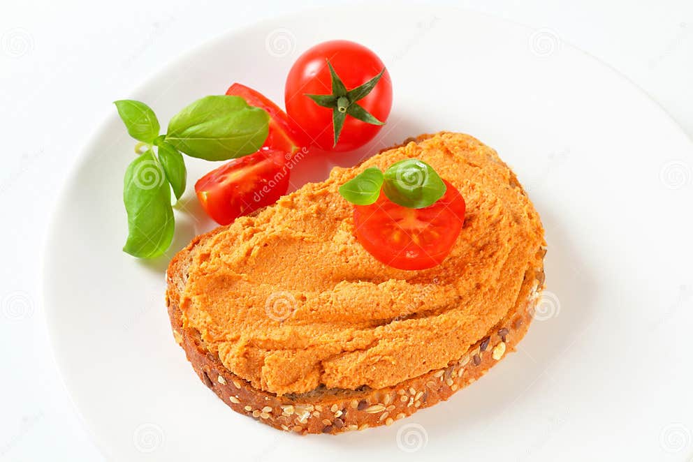 Bread with tomato spread stock image. Image of snack 32063737