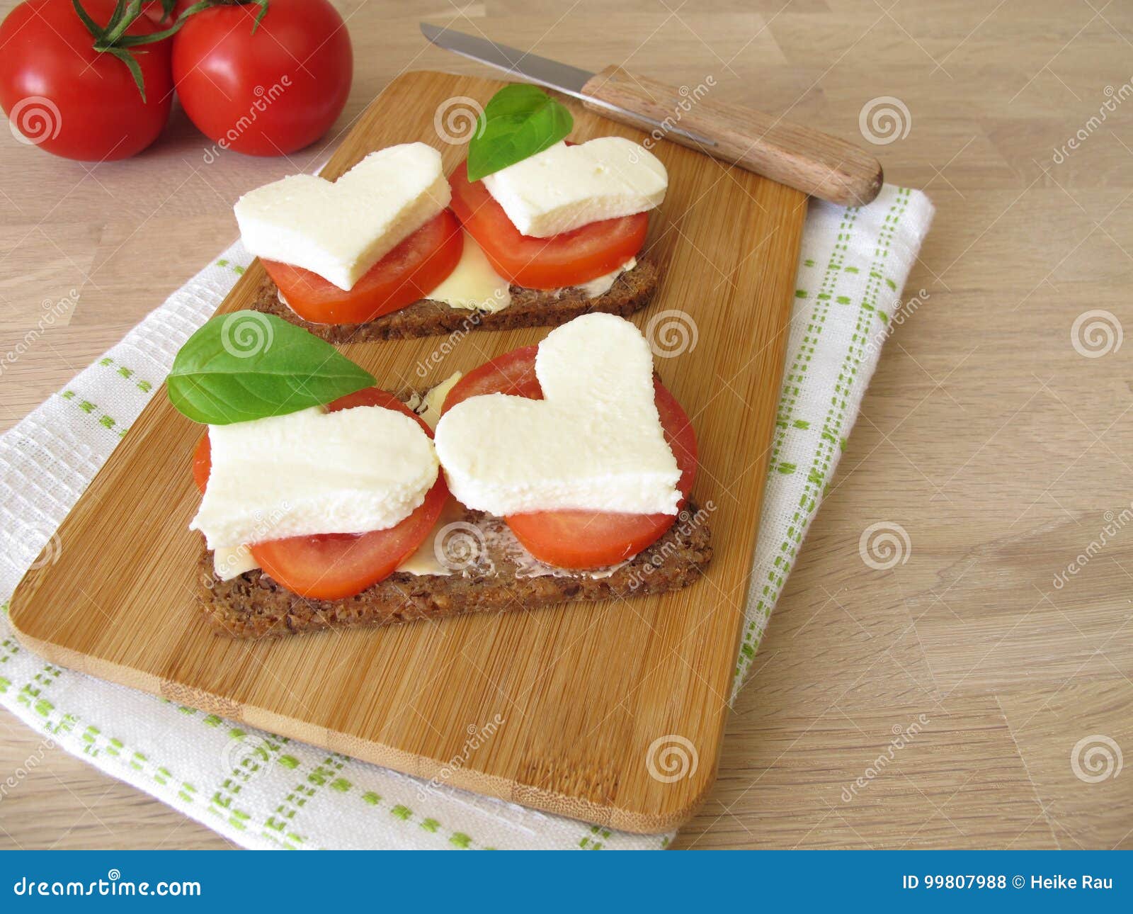 Bread with Tomatoes, Mozzarella Heart and Basil Stock Photo Image of