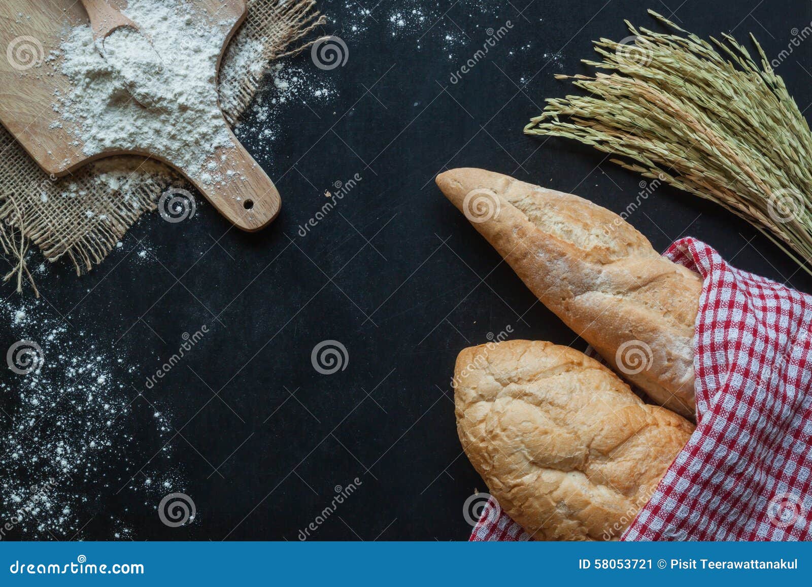 Bread , Wheat and Flour on Black Chalkboard , Bakery Background Stock
