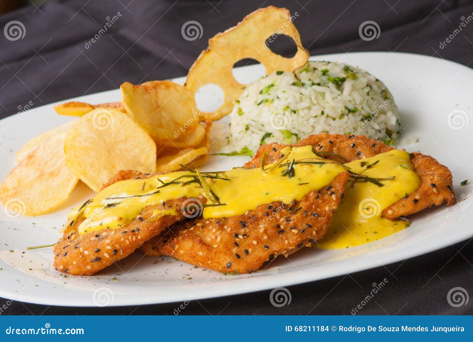 Breaded Fish with sauce stock photo. Image of pepper 68211184