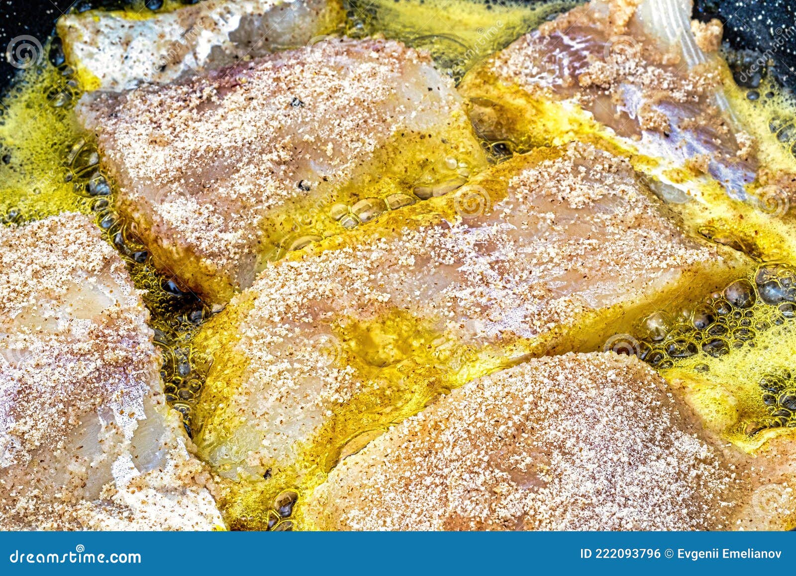 Breaded Fish Steaks, Fried in a Pan with Vegetable Oil Stock Photo