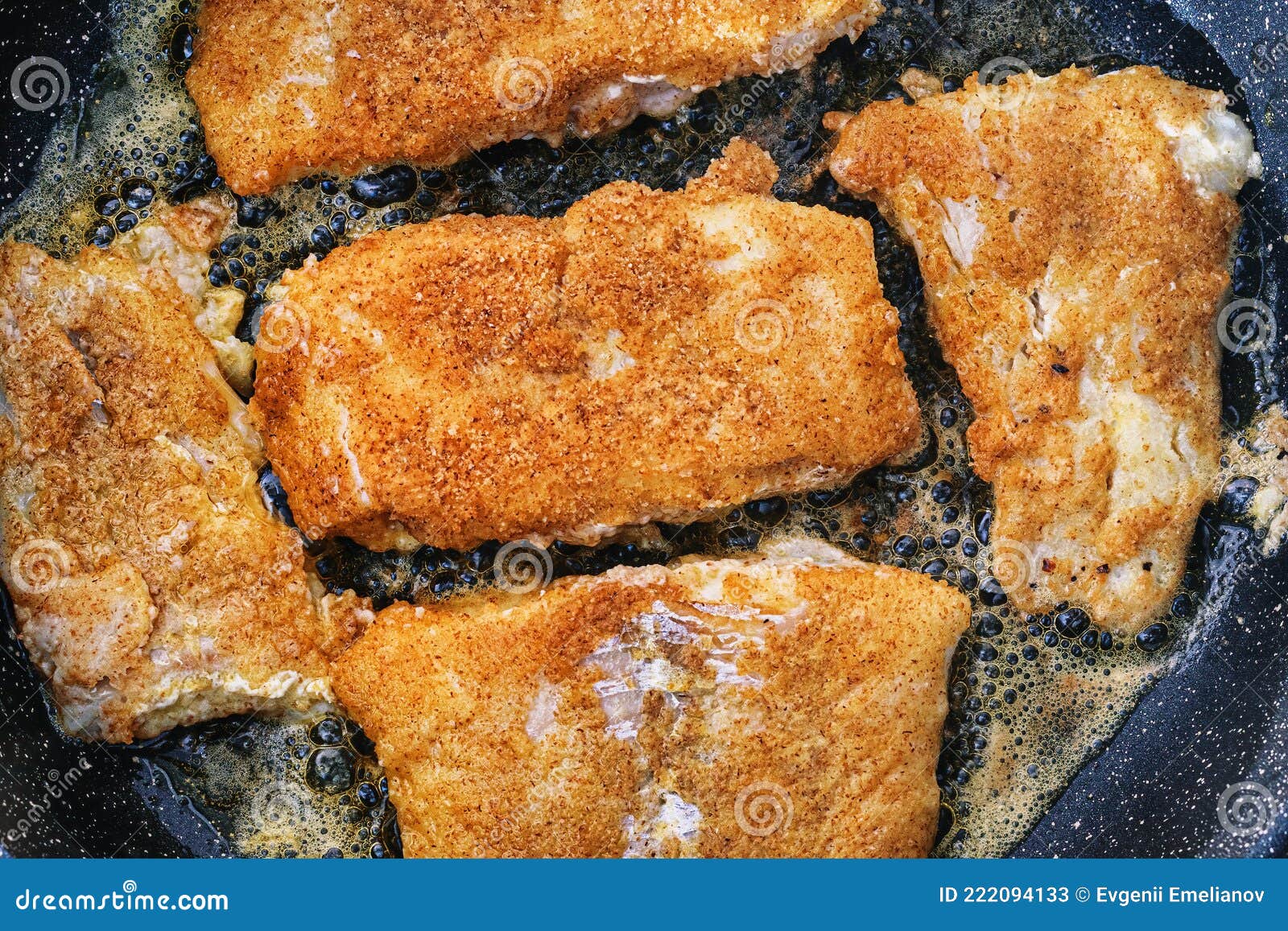 Breaded Fish Steaks, Fried in a Pan with Vegetable Oil Stock Image