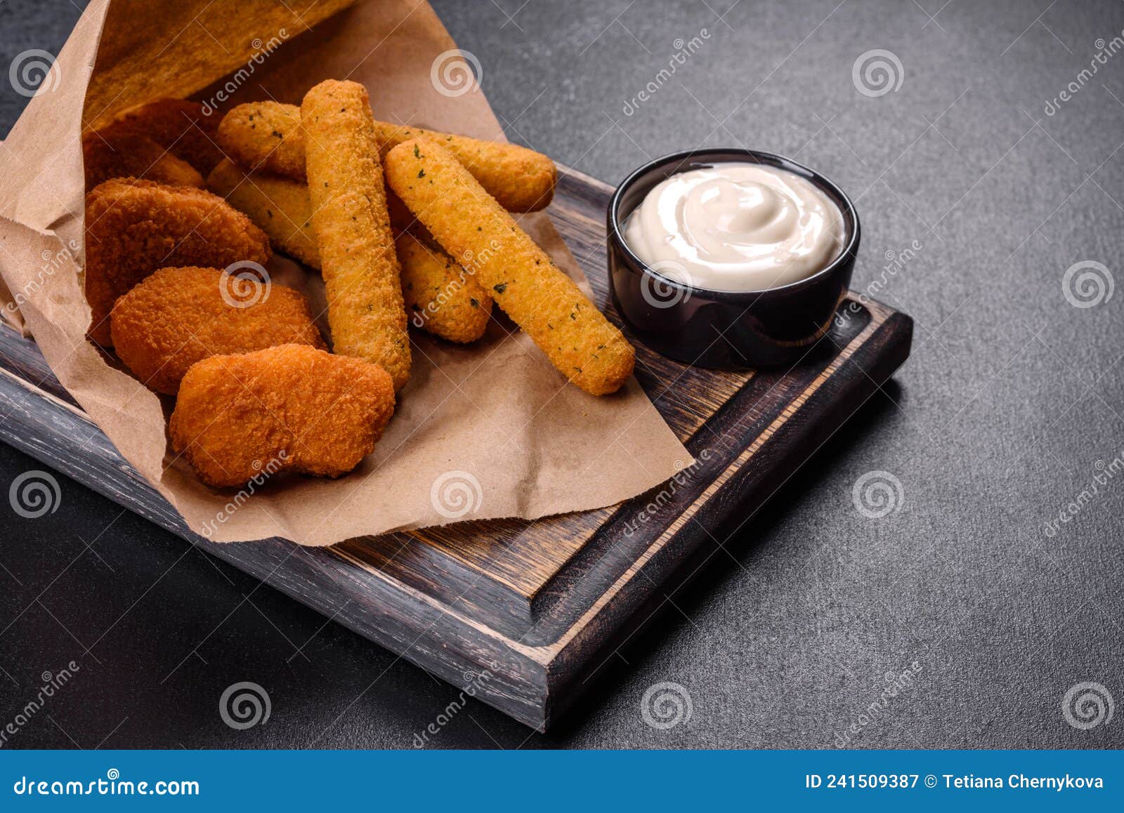 Breaded Mozzarella Cheese Sticks Served with Tomato Sauce Stock Image