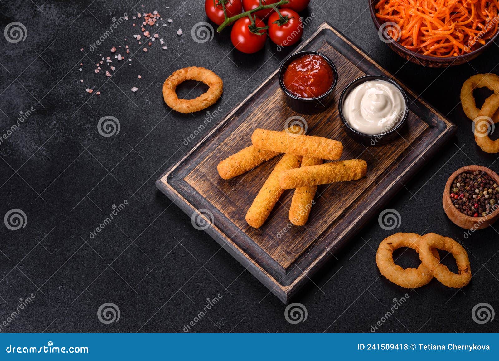 Breaded Mozzarella Cheese Sticks Served with Tomato Sauce Stock Photo