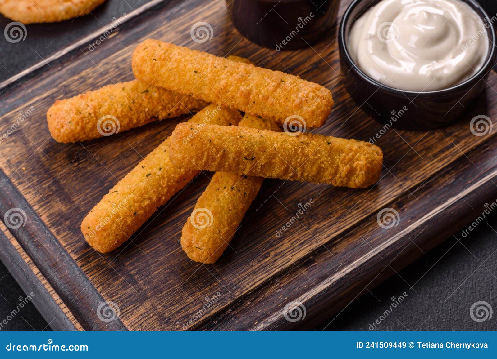 Breaded Mozzarella Cheese Sticks Served with Tomato Sauce Stock Image