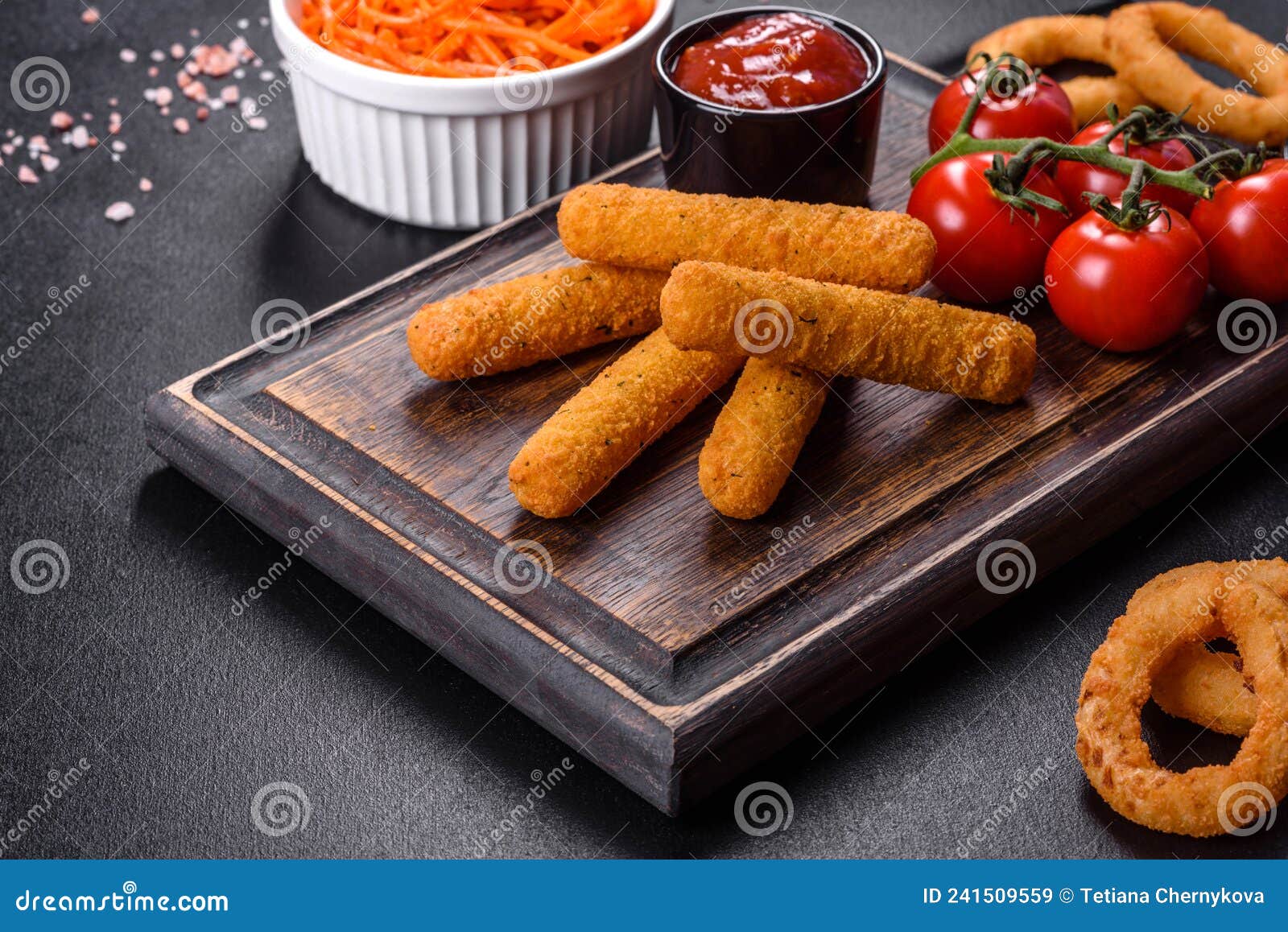 Breaded Mozzarella Cheese Sticks Served with Tomato Sauce Stock Image