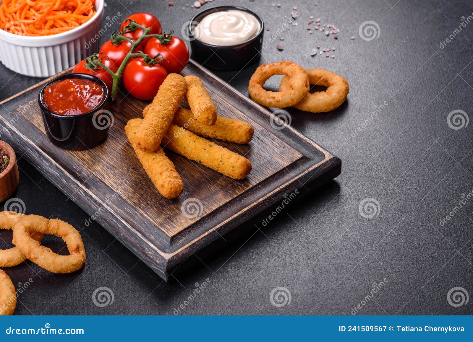 Breaded Mozzarella Cheese Sticks Served with Tomato Sauce Stock Image