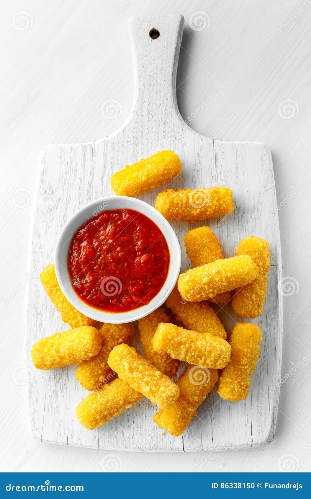 Breaded Mozzarella Cheese Sticks with Tomato Basil Sauce Stock Photo