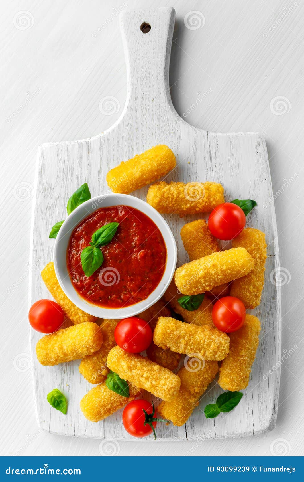 Breaded Mozzarella Cheese Sticks with Tomato Basil Sauce Stock Image