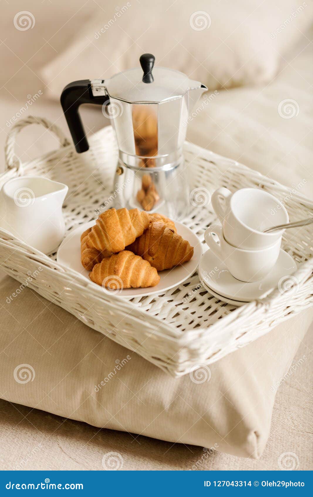Breakfast in Bed. on a White Wicker Tray There is a Coffee Maker Stock