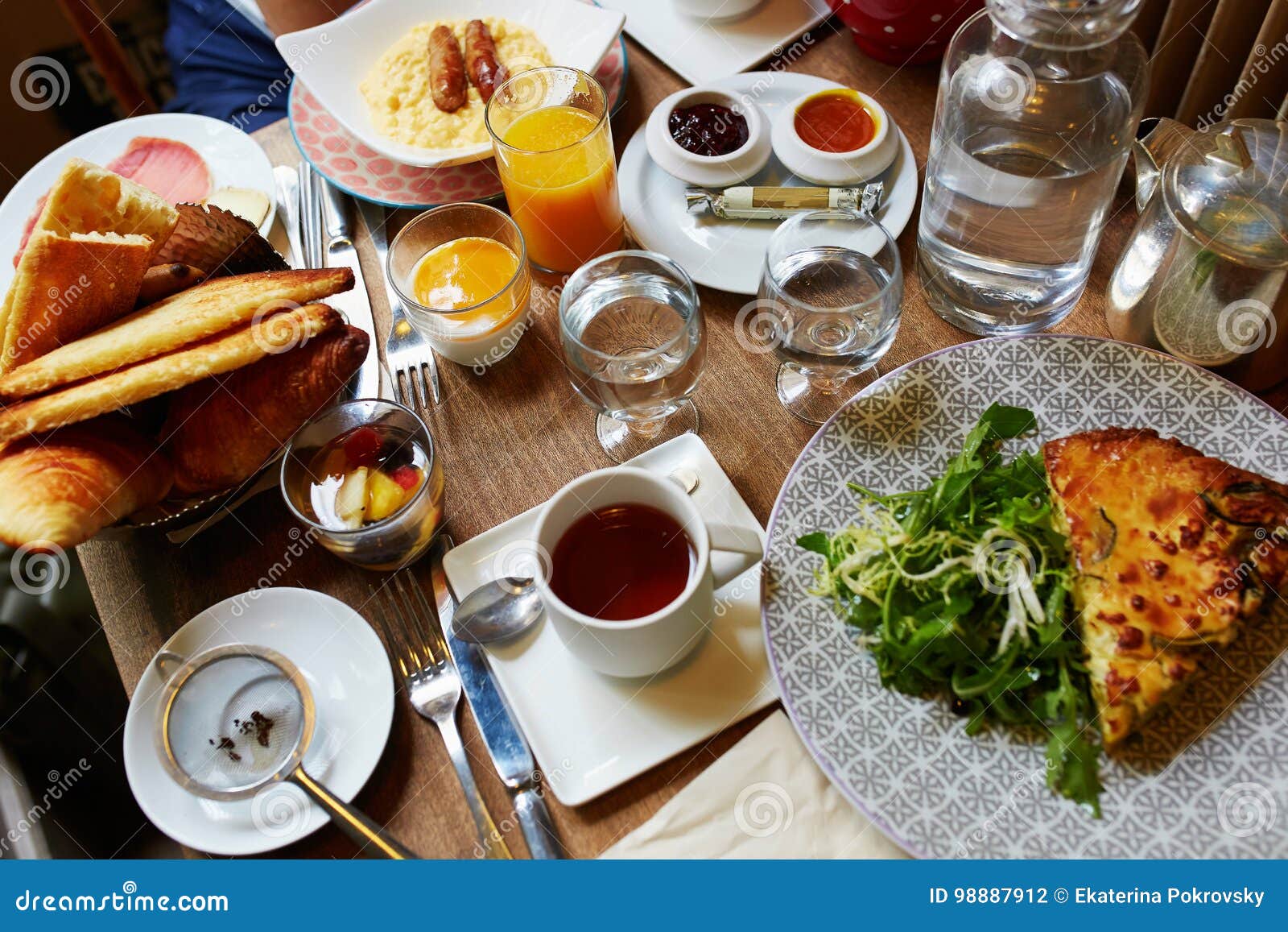 Breakfast or Brunch with Tea, Coffee, Juice, Eggs and Pastry Stock