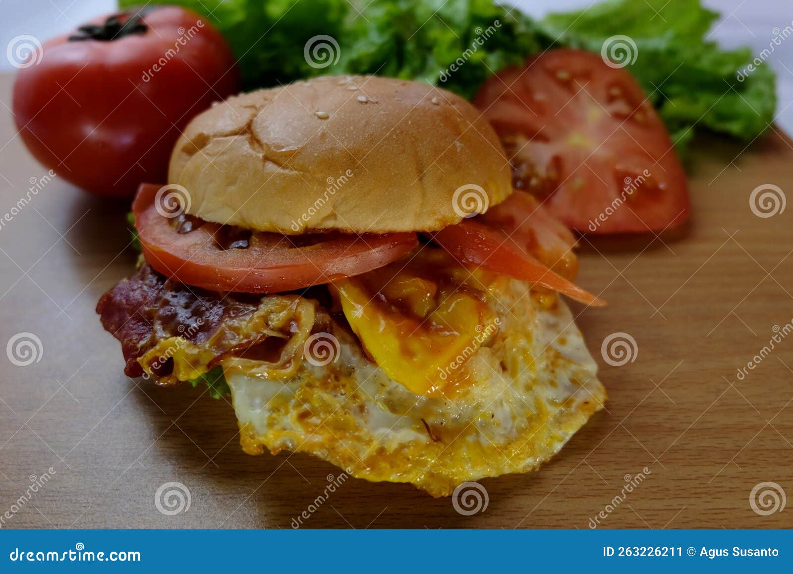 Breakfast Burger with Fried Eggs, Cheese and Bacon Stock Image - Image