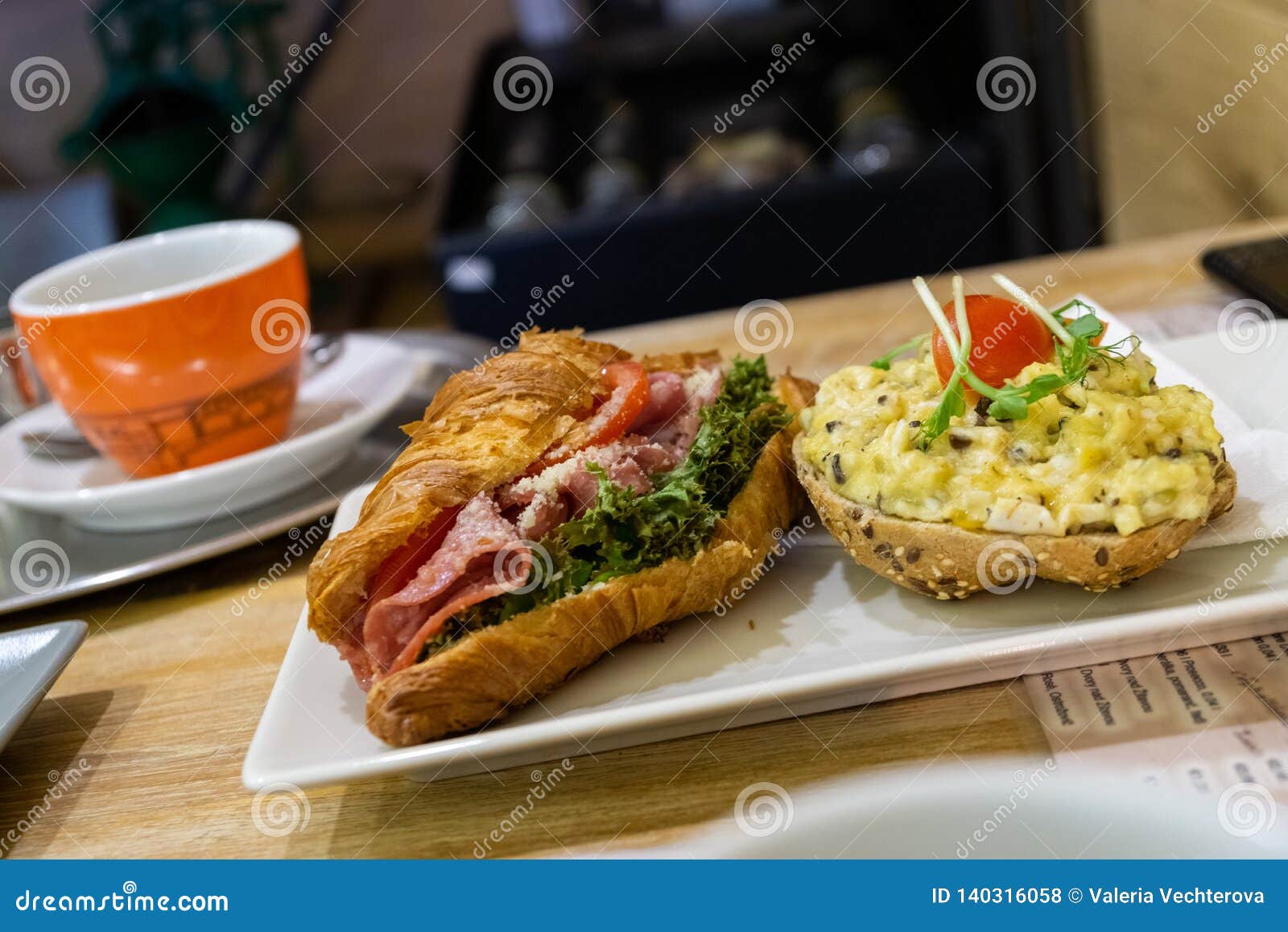 Sandwich and Kaiser with Ham, Salad, Cheese and Smashed Eggs, Coffee in