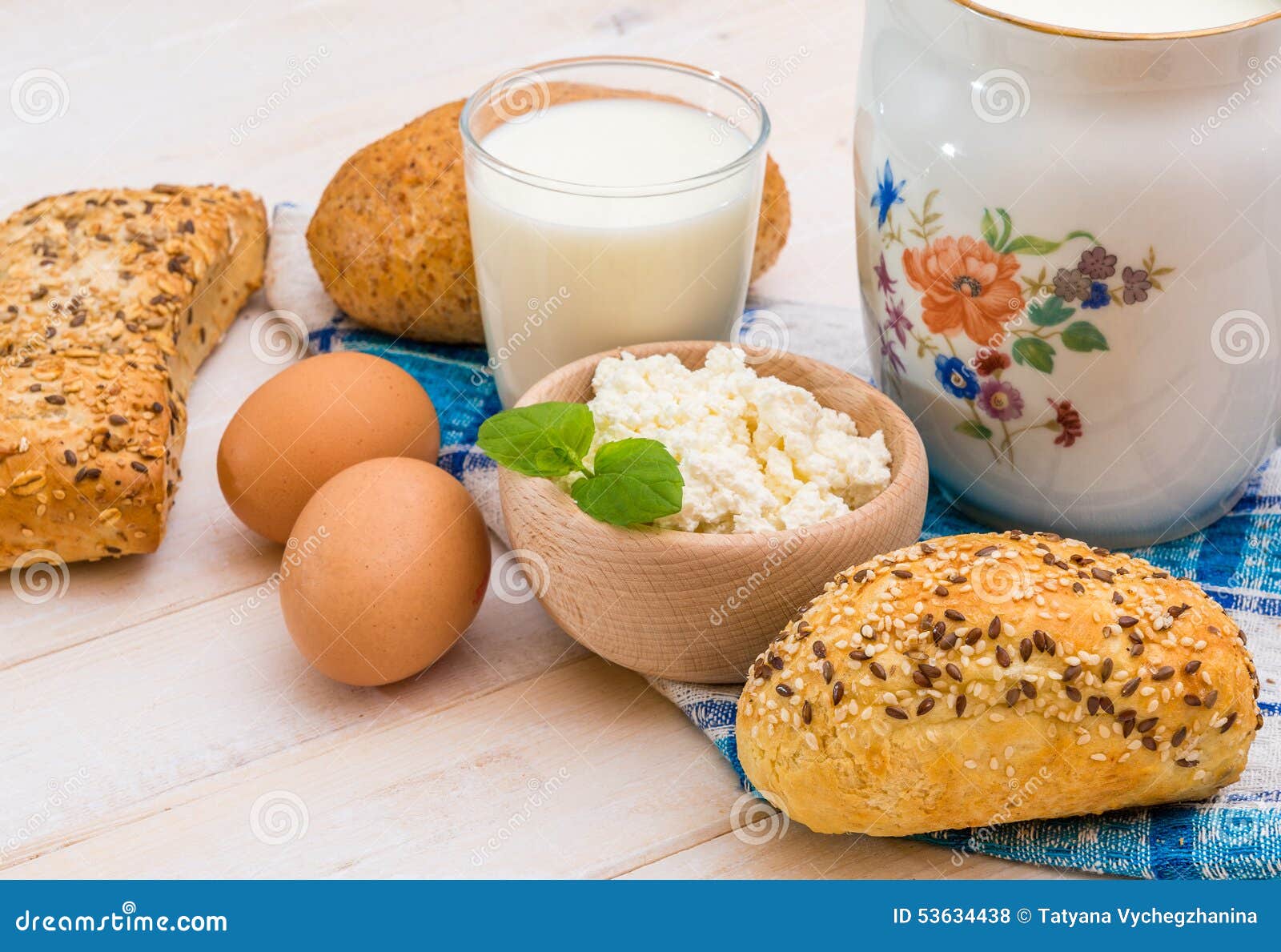 breakfast cheese milk bread eggs light wooden background 53634438