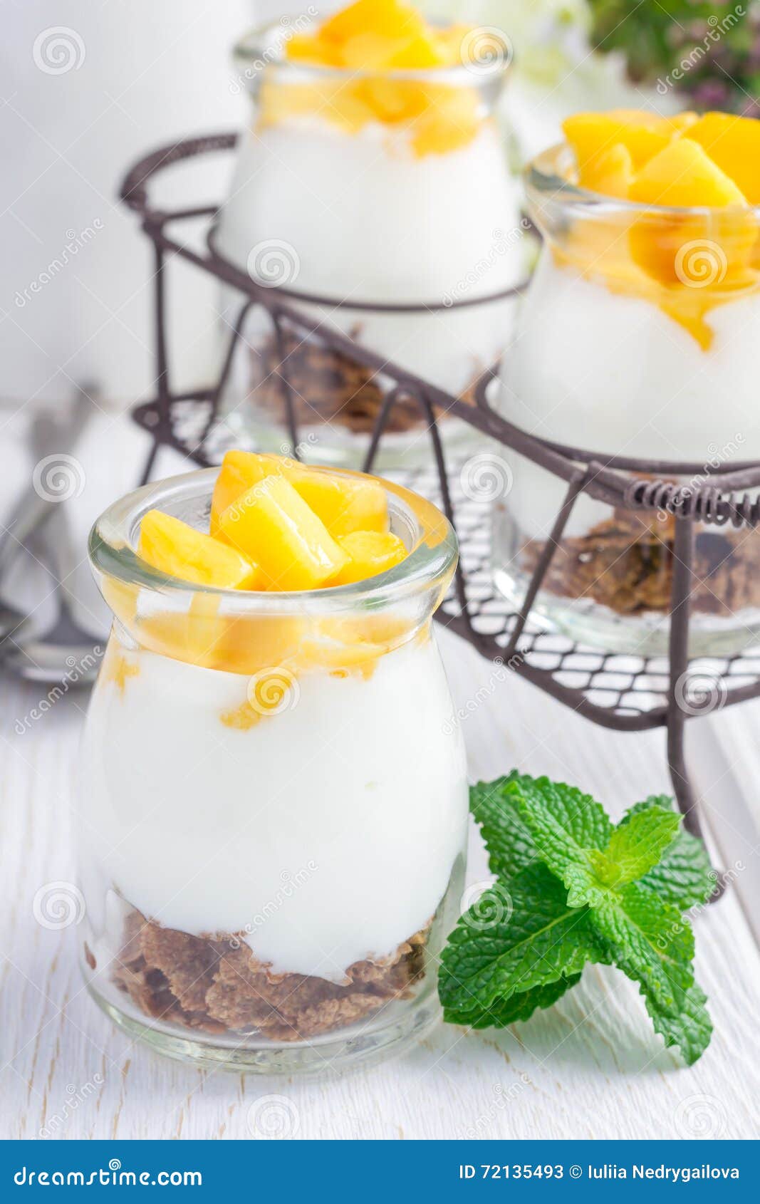 Breakfast Dessert with Bran Flakes, Plain Yogurt and Mango, Closeup