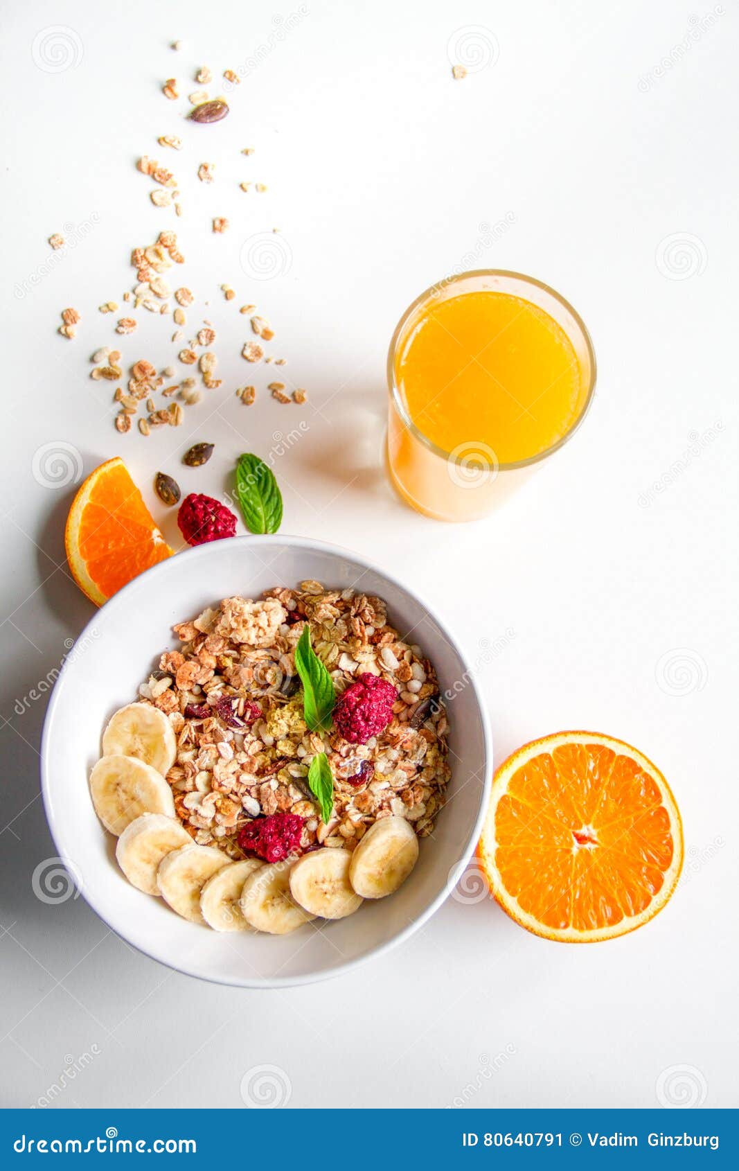Breakfast with Oatmeal and Orange Juice on White Background Stock Image