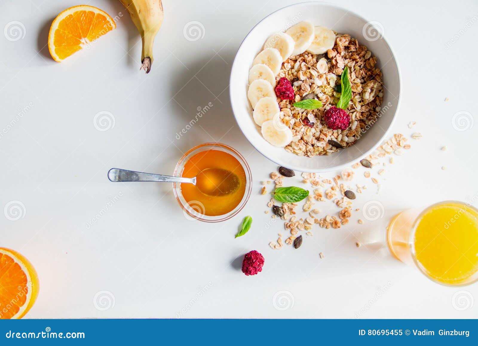 Breakfast with Oatmeal and Orange Juice on White Background Stock Image