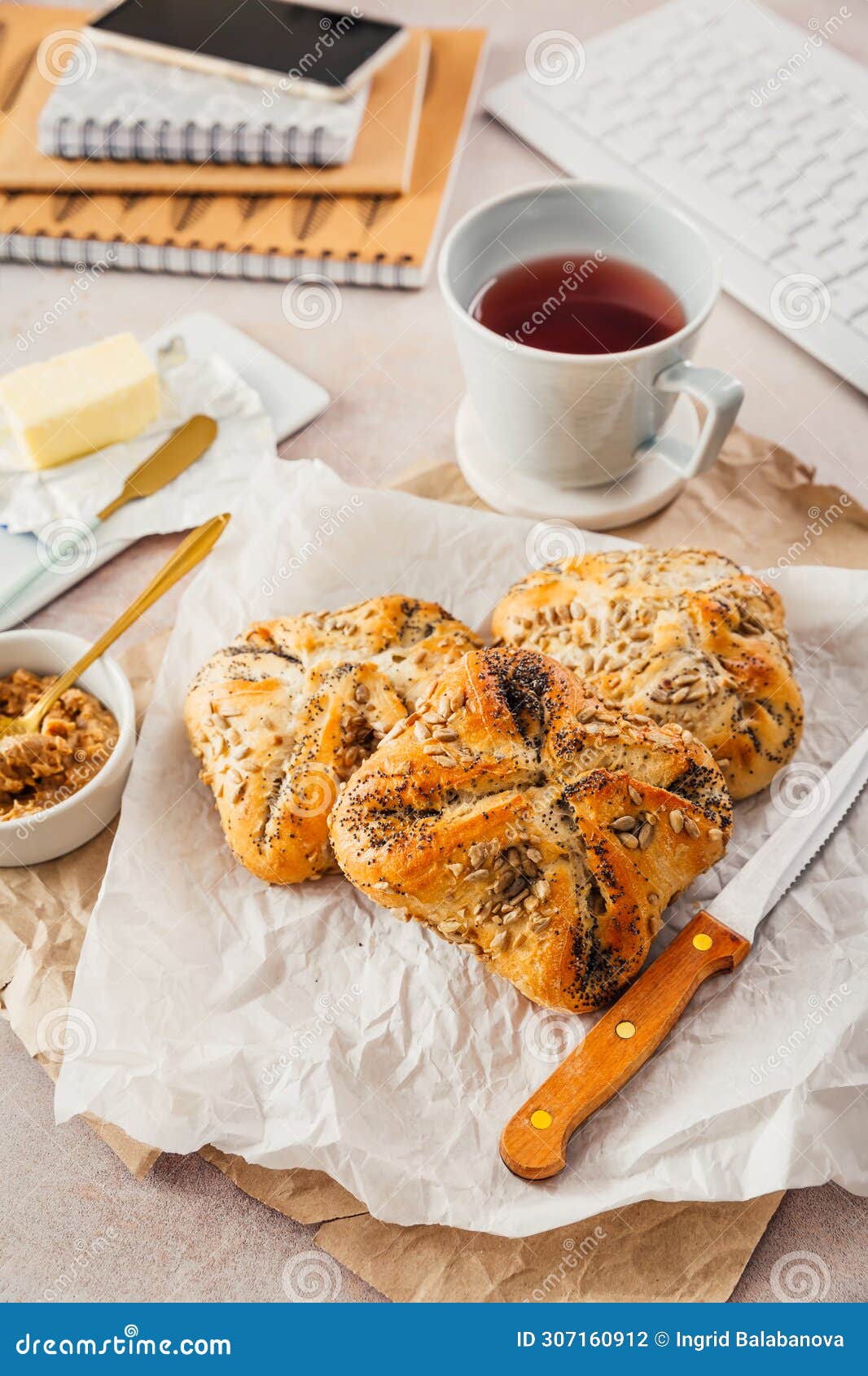 Breakfast at Office Workplace, Fresh Bread Rolls with Butter and Cup of
