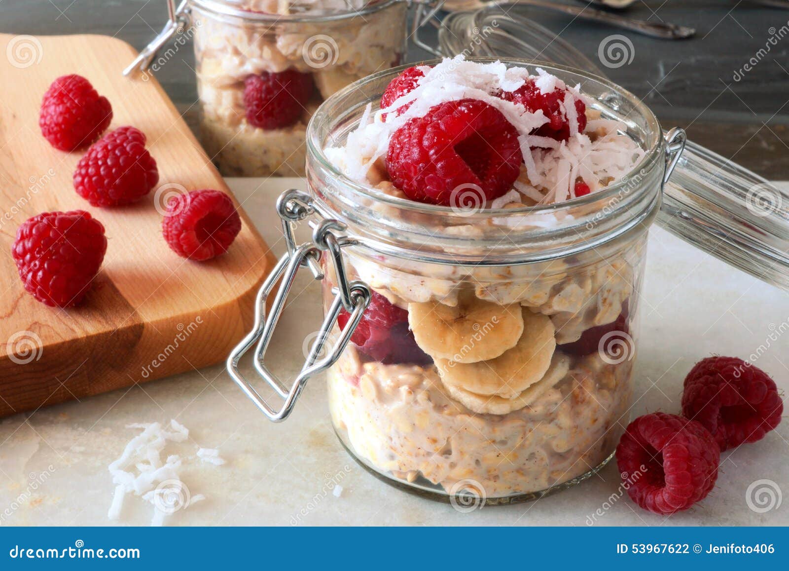 breakfast overnight oats with fresh raspberries in a jar