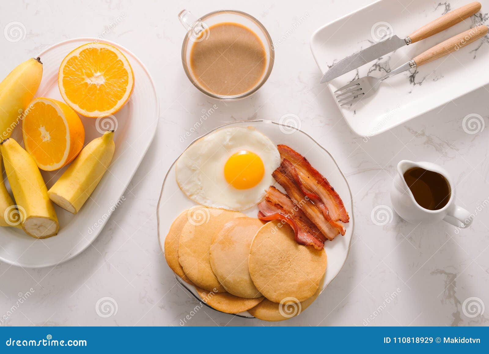 Breakfast Plate with Pancakes, Eggs, Bacon and Fruit. Stock Image