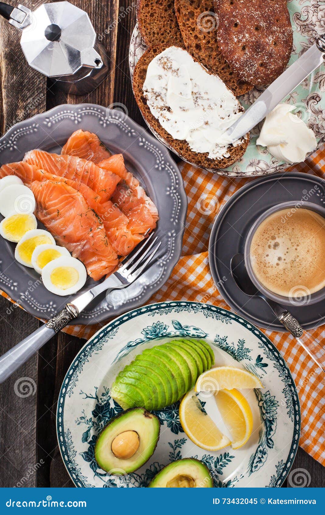Breakfast with Salmon, Eggs, Avocado, Bread, Cheese and Coffee Stock