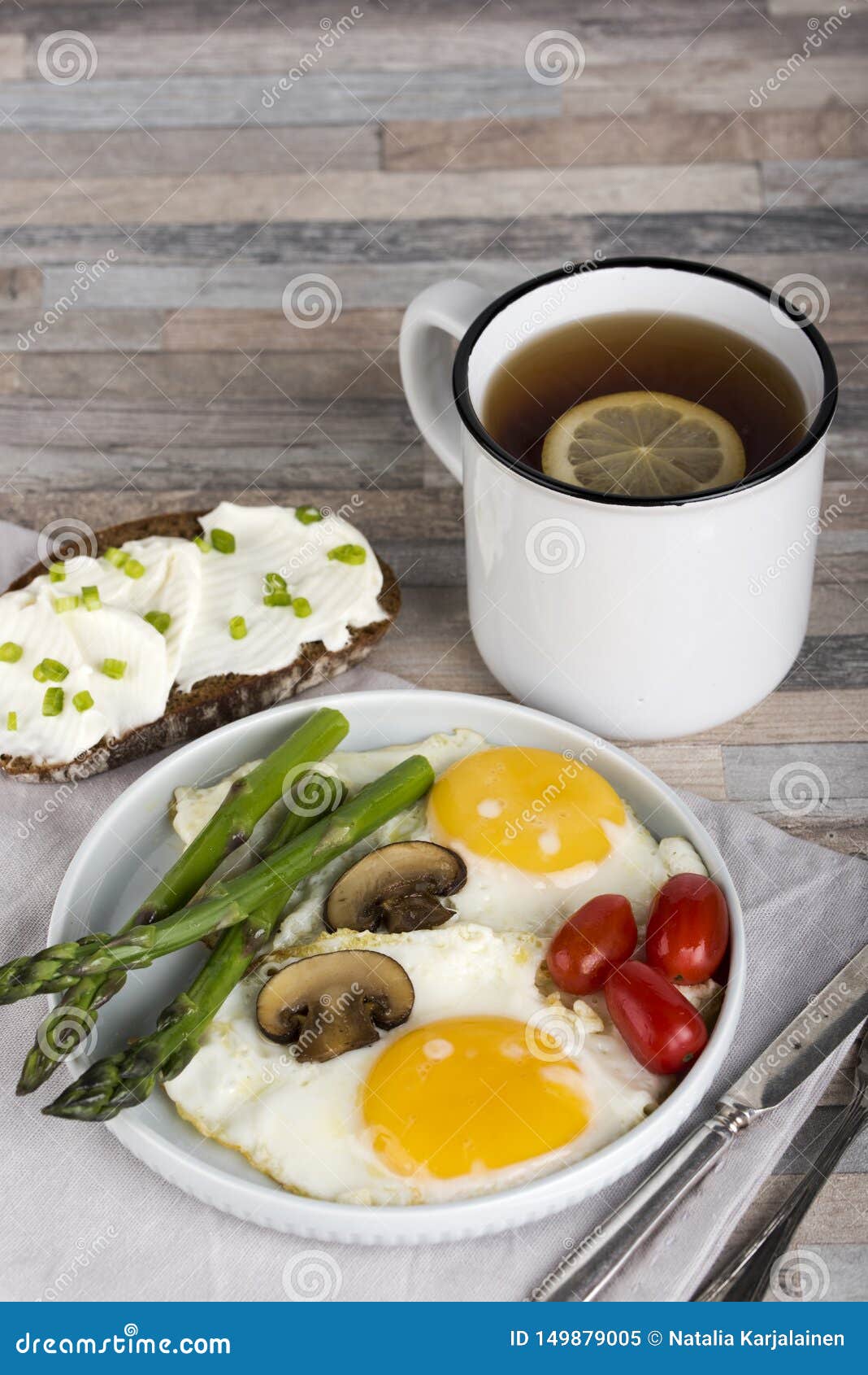 Breakfast. Scrambled Eggs, Asparagus, Champignons, Cherry Tomatoes