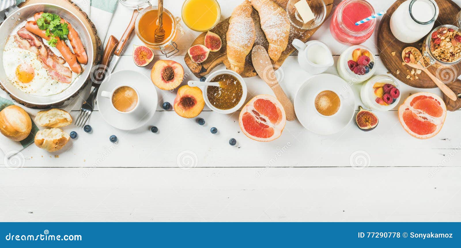 breakfast snacks and drinks set on white wooden background