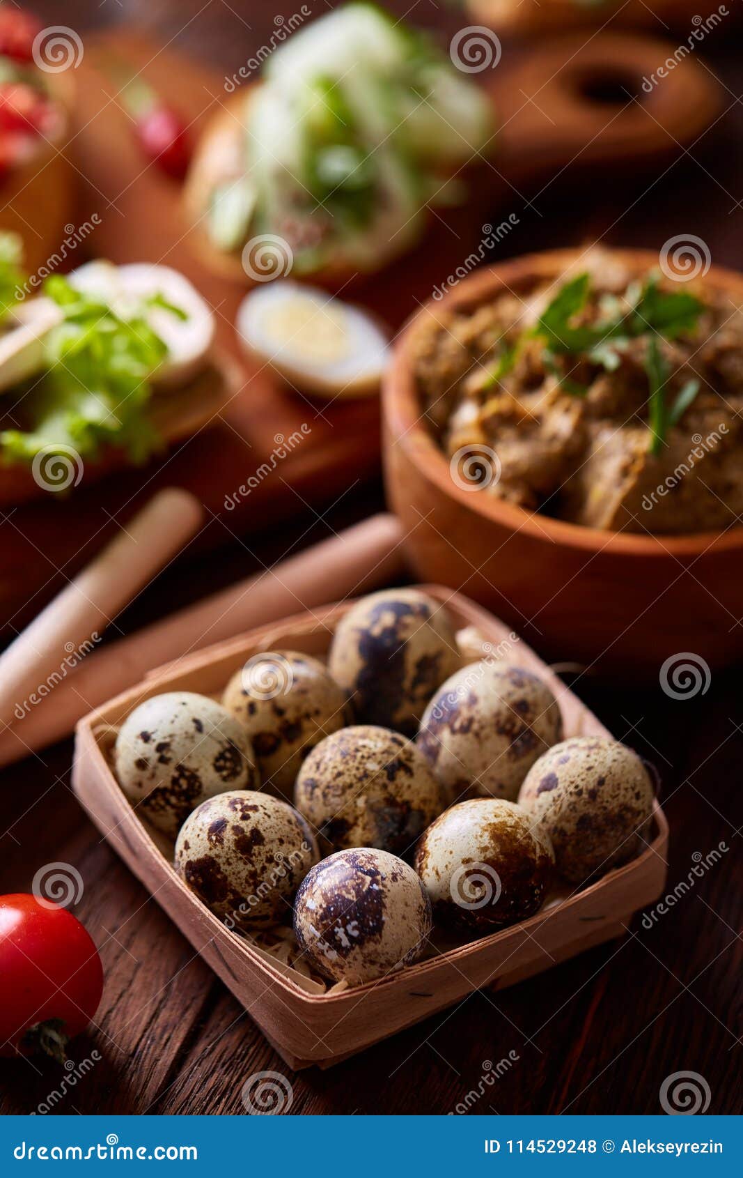 breakfast still life with sandwiches, quail eggs, spicies and fresh fruits and vegetables, selective focus