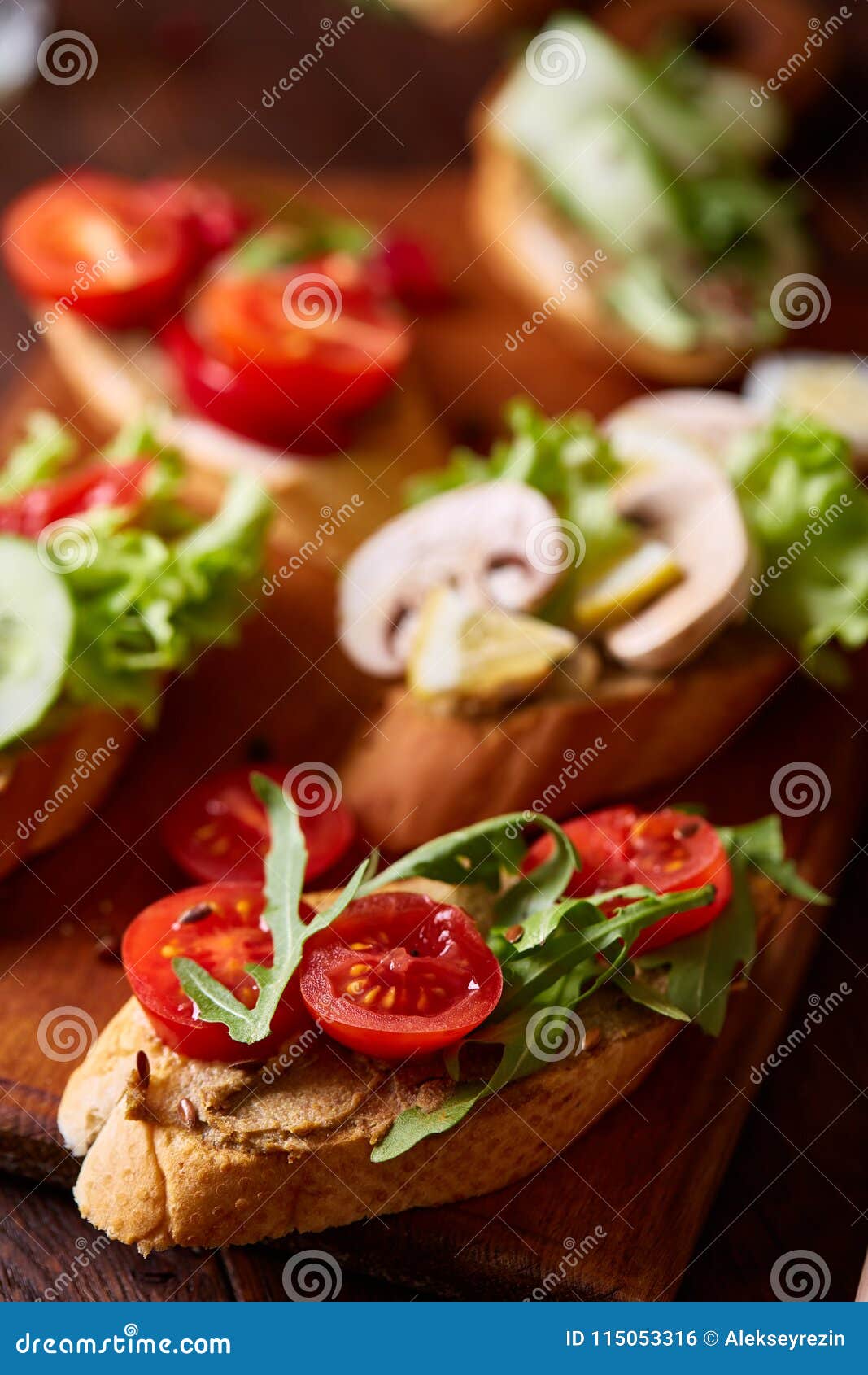 breakfast still life with sandwiches, quail eggs, spicies and fresh fruits and vegetables, selective focus