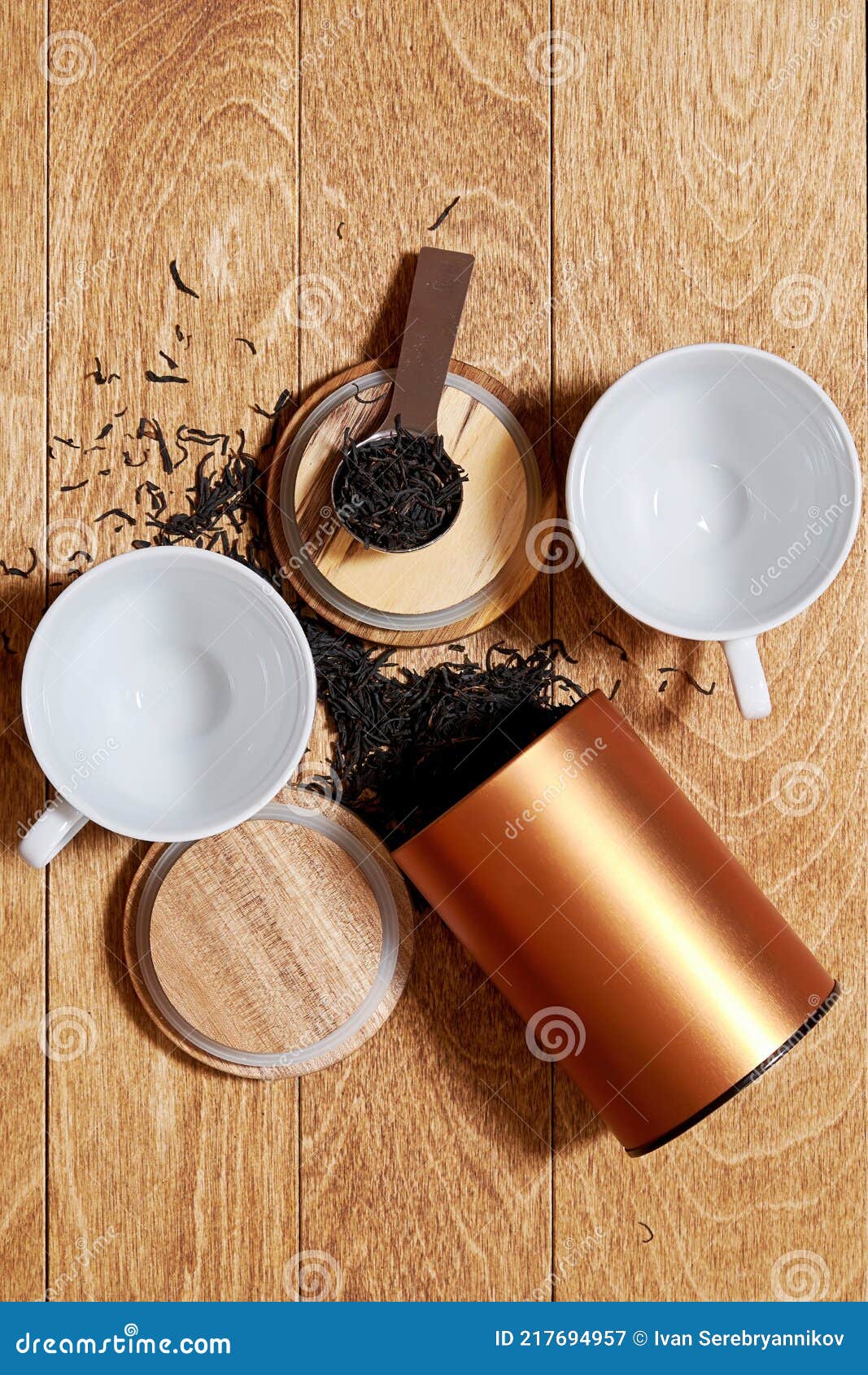 Breakfast Teacups with Tea Jar and Cup Holders Prepared for Eating
