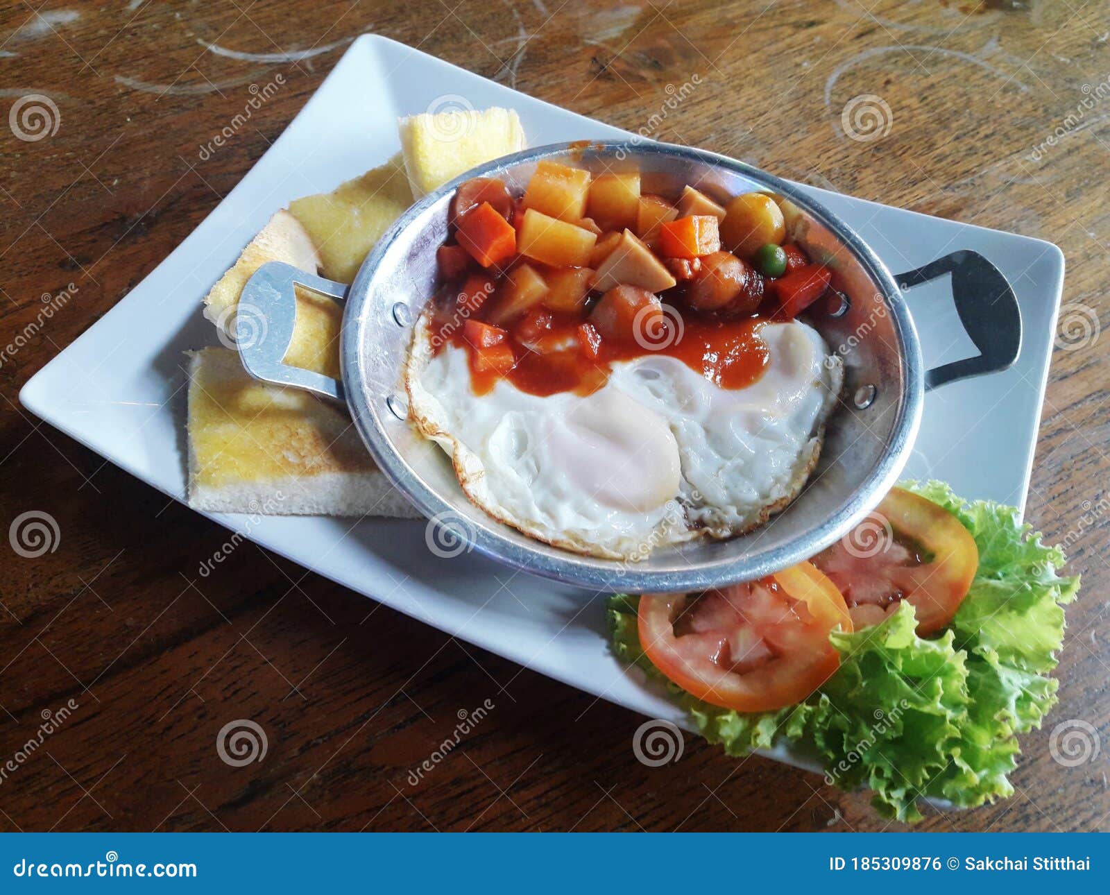Breakfast Thai Style Pan Fried Egg with Toppings. Stock Photo Image