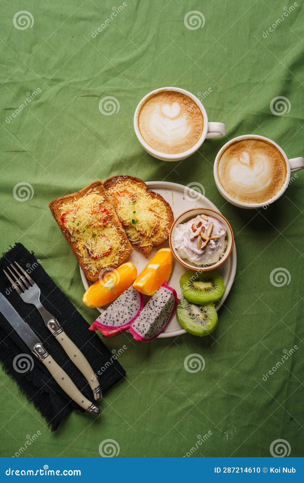 Breakfast Toast with Cheese and Tomatoes, Fruit, Yogurt Stock Photo