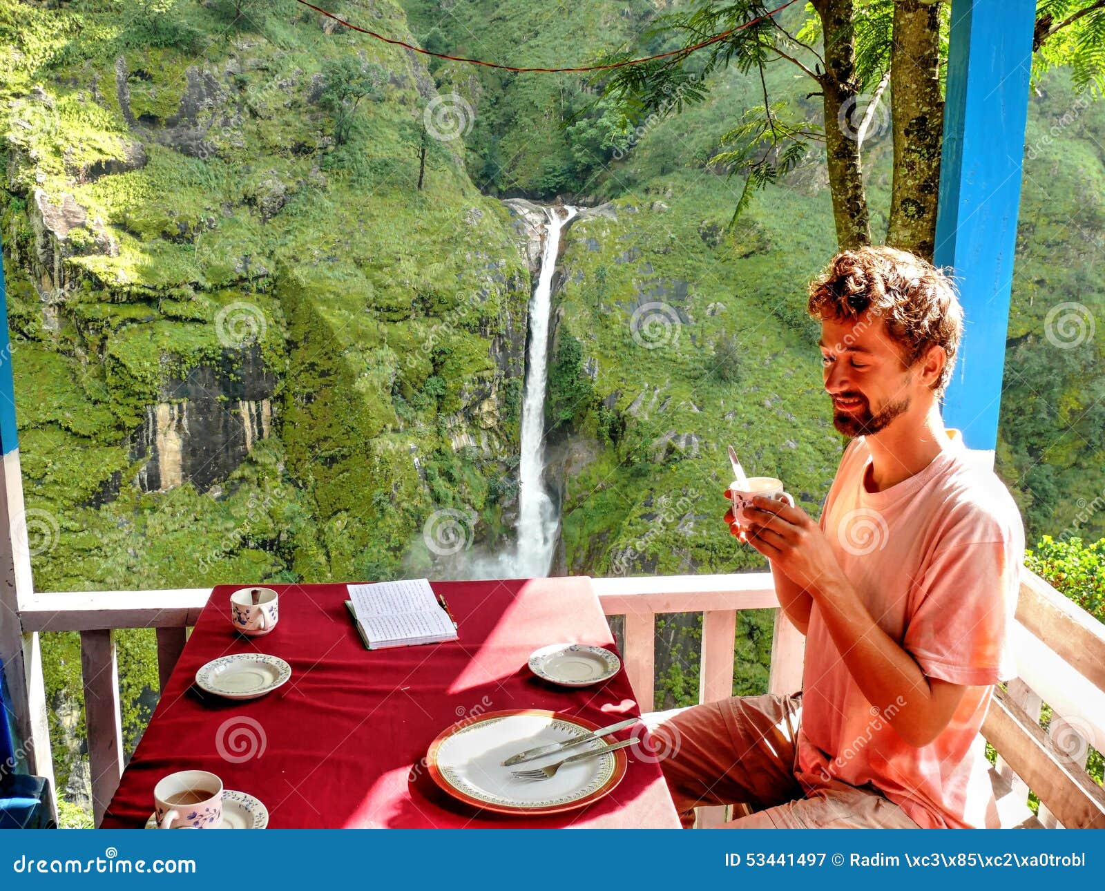 breakfast with a waterfall view in chyamche, nepal