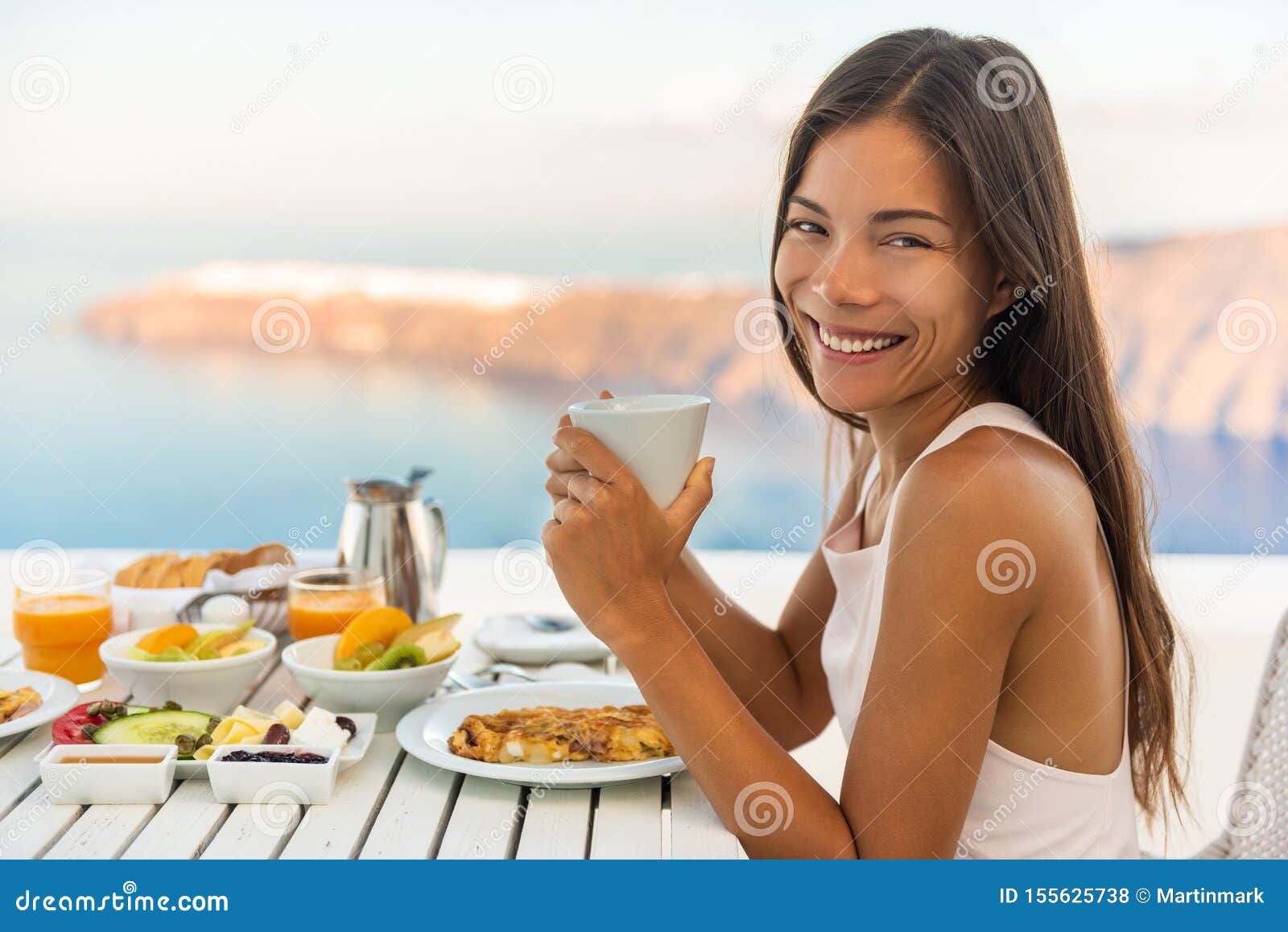Breakfast Woman Eating Brunch at Luxury Travel Hotel Restaurant