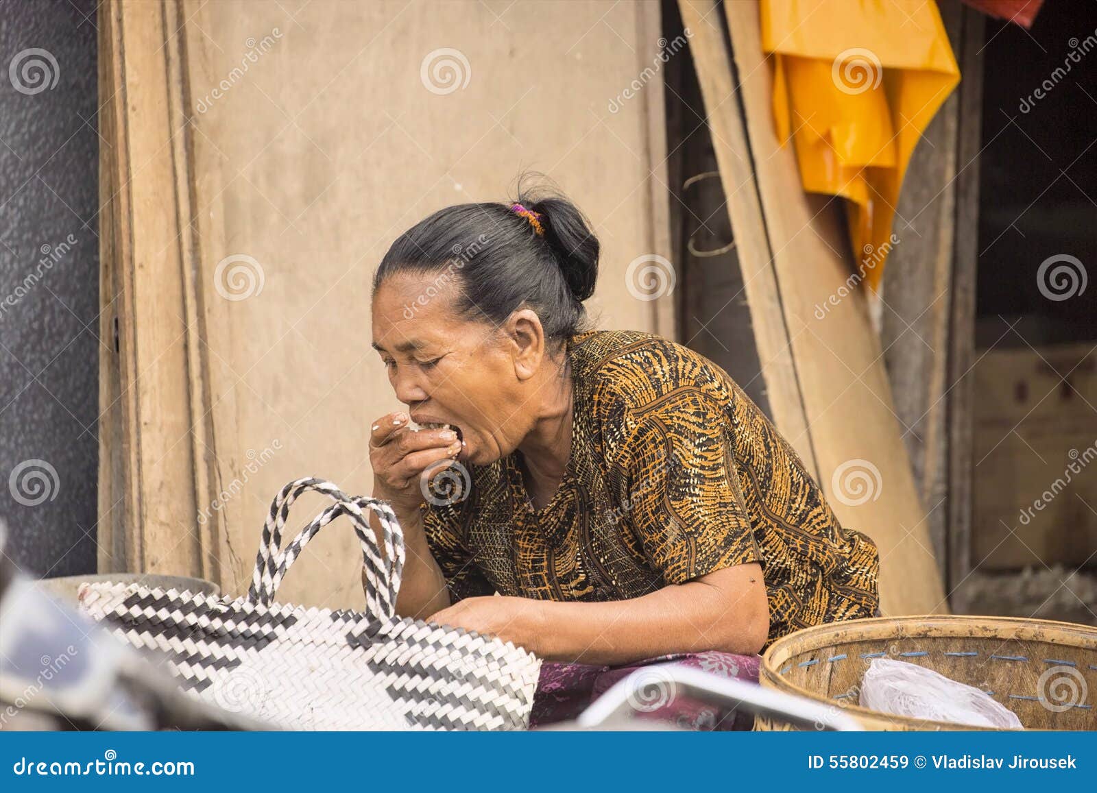 : Breakfast,woman at the Market, Village Toyopakeh, Nusa Penida June 24