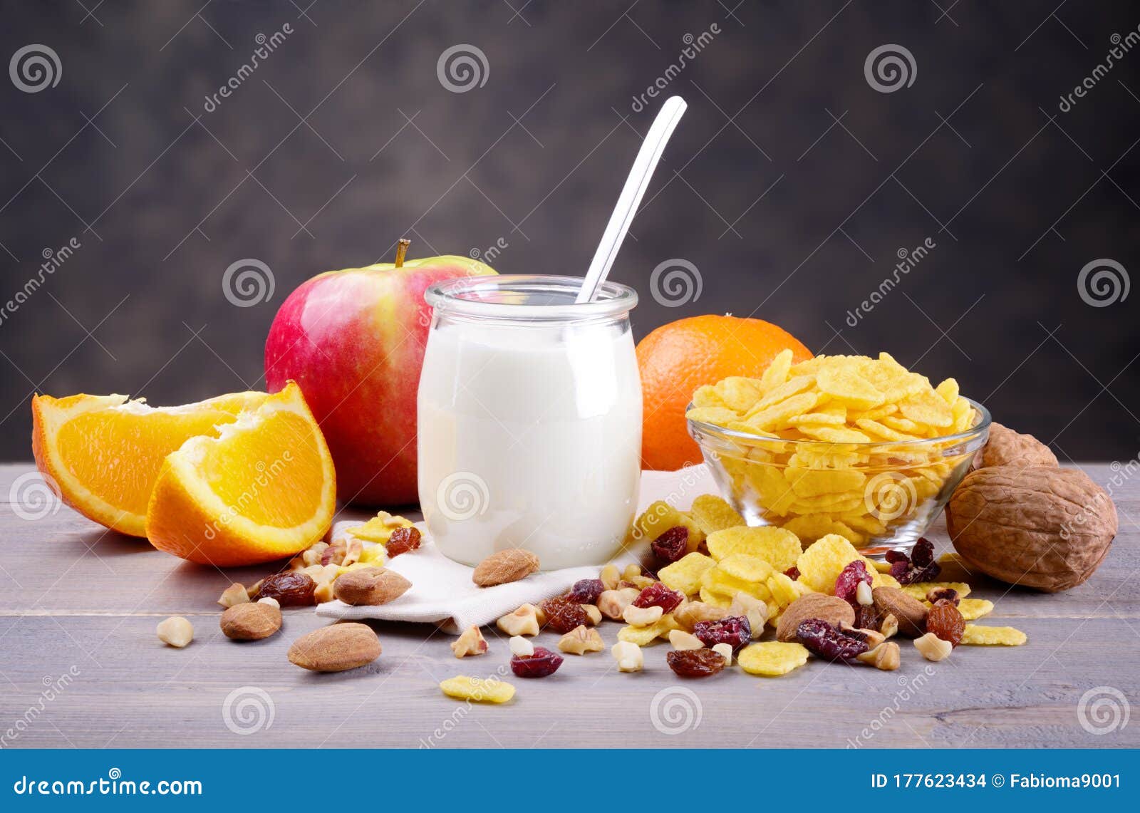 Breakfast with Yogurt, Muesli, Corn Flakes and Fruit. Stock Photo