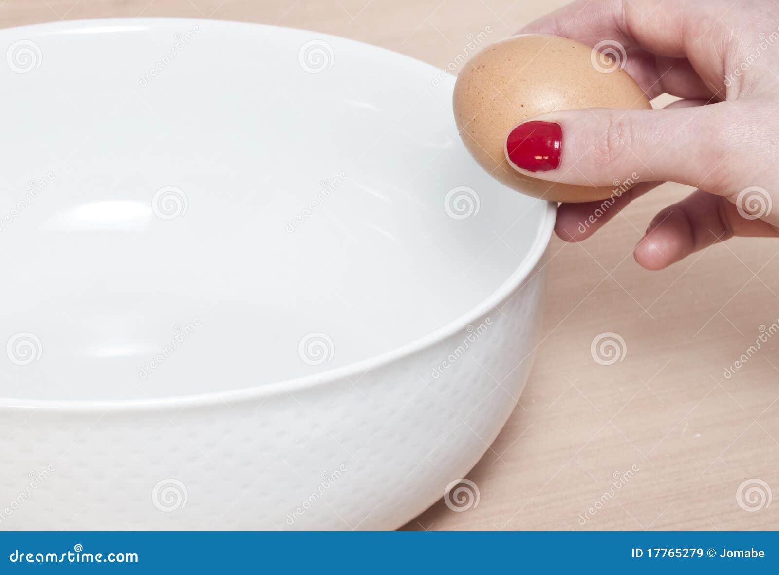 Breaking an Egg into a Bowl Stock Image Image of sweet, prepare 17765279