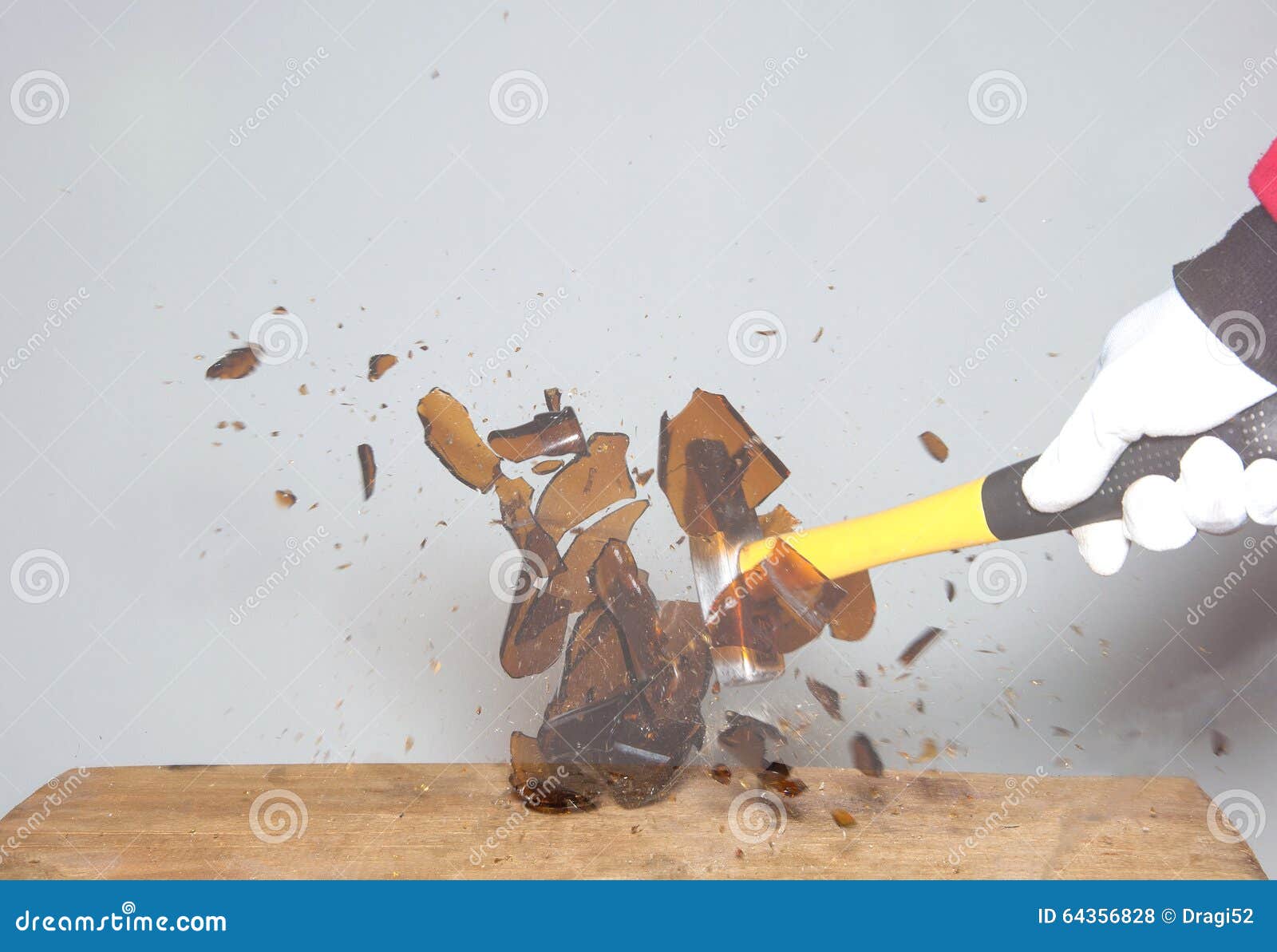 Breaking a glass bottle stock photo. Image of beverage 64356828