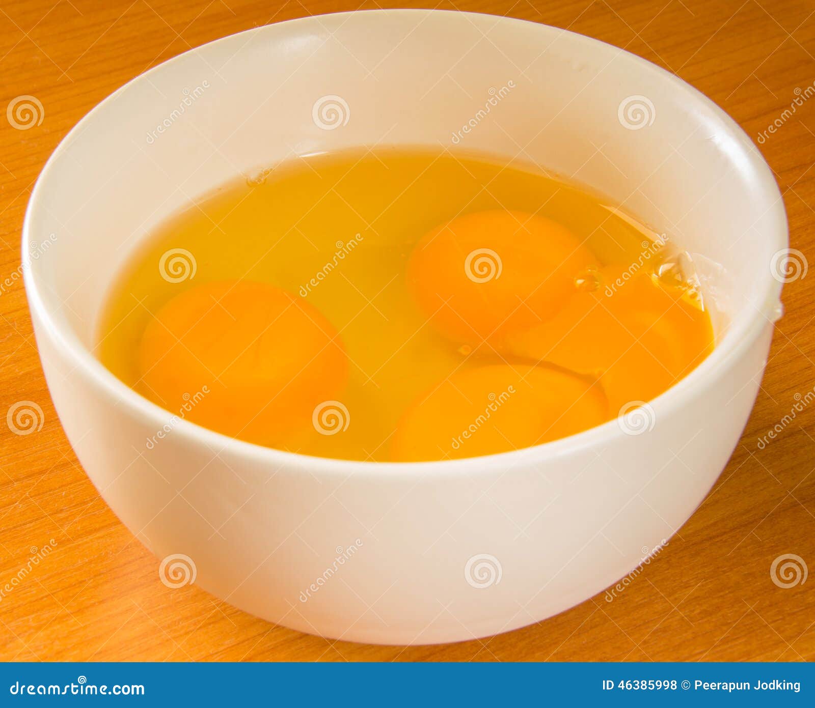 The breaks egg in a cup stock photo. Image of bake, diet 46385998