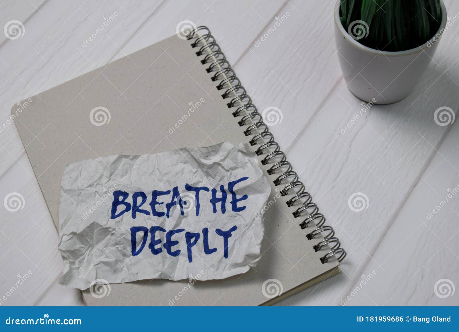 breathe deeply write on sticky notes  on office desk