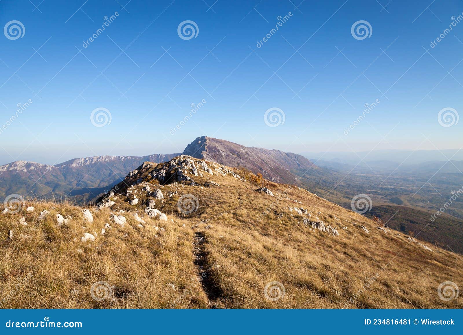 breathtaking autumn view of trem summit on dry mountain (suva planina) in serbia
