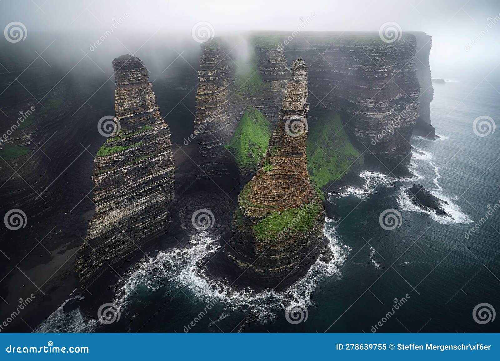 misty cliffs along rocky coastline