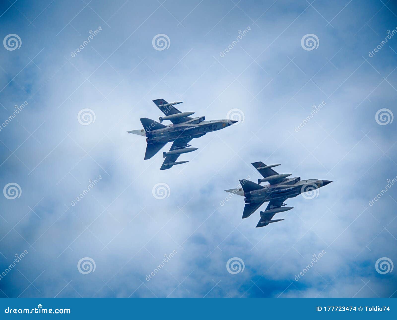 Fighter Planes Speeding through the Sky Armed with Bombs during a ...