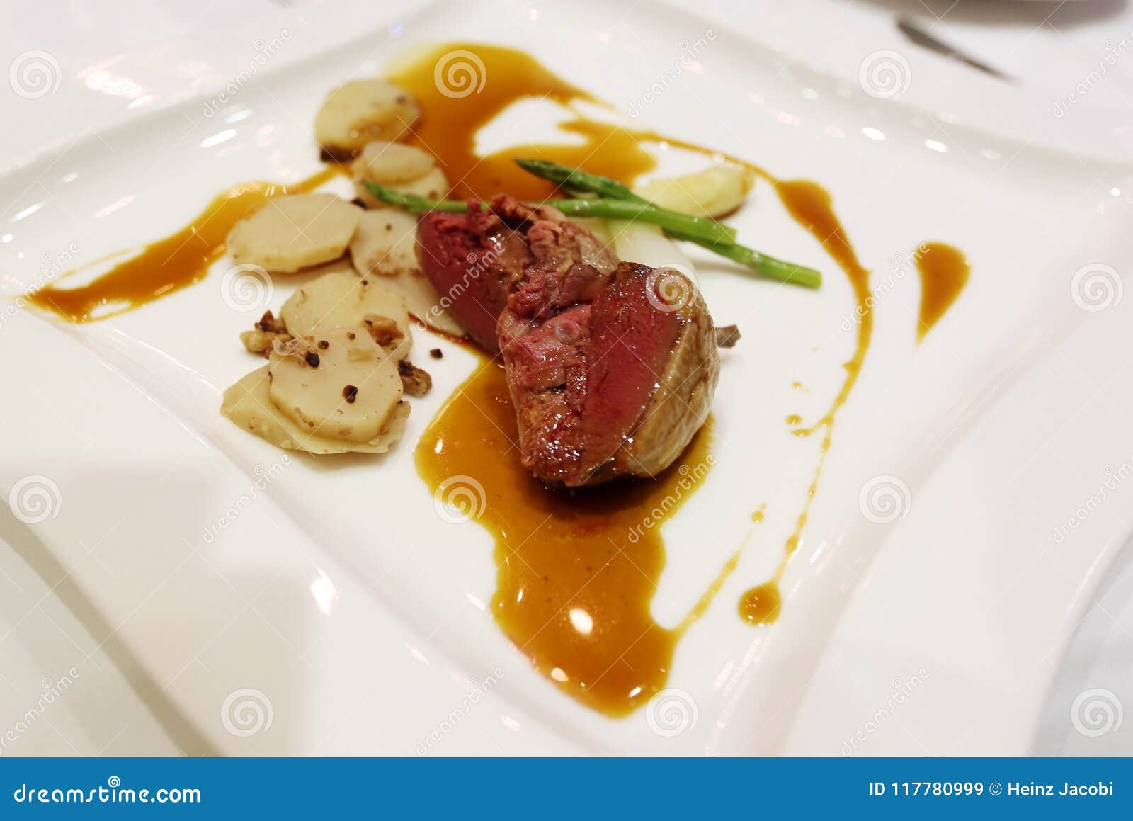 bresse pigeon with ginger stock and cinnamon potato