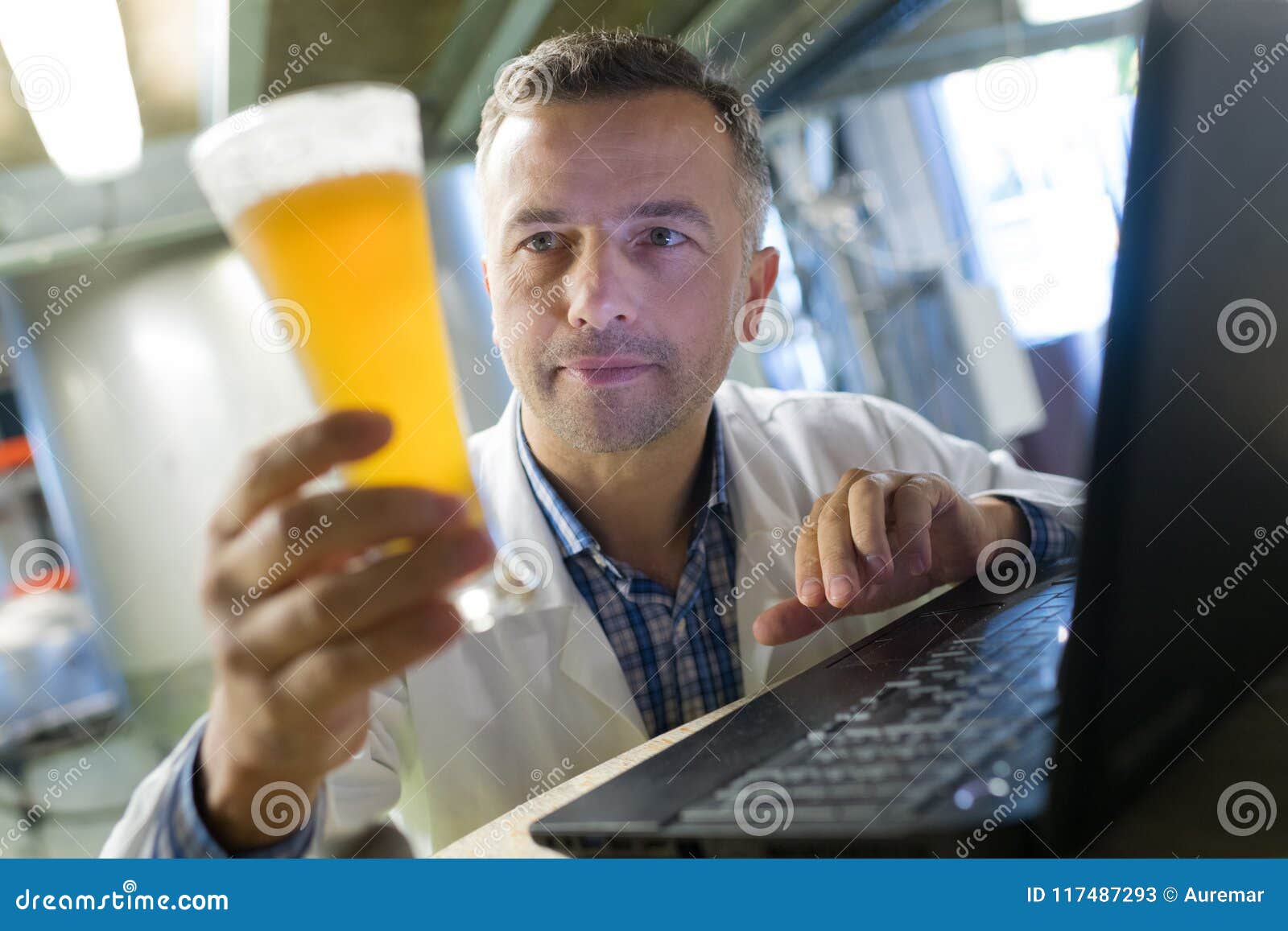 Brewer in Uniform Tasting Beer Stock Image Image of career, indoors