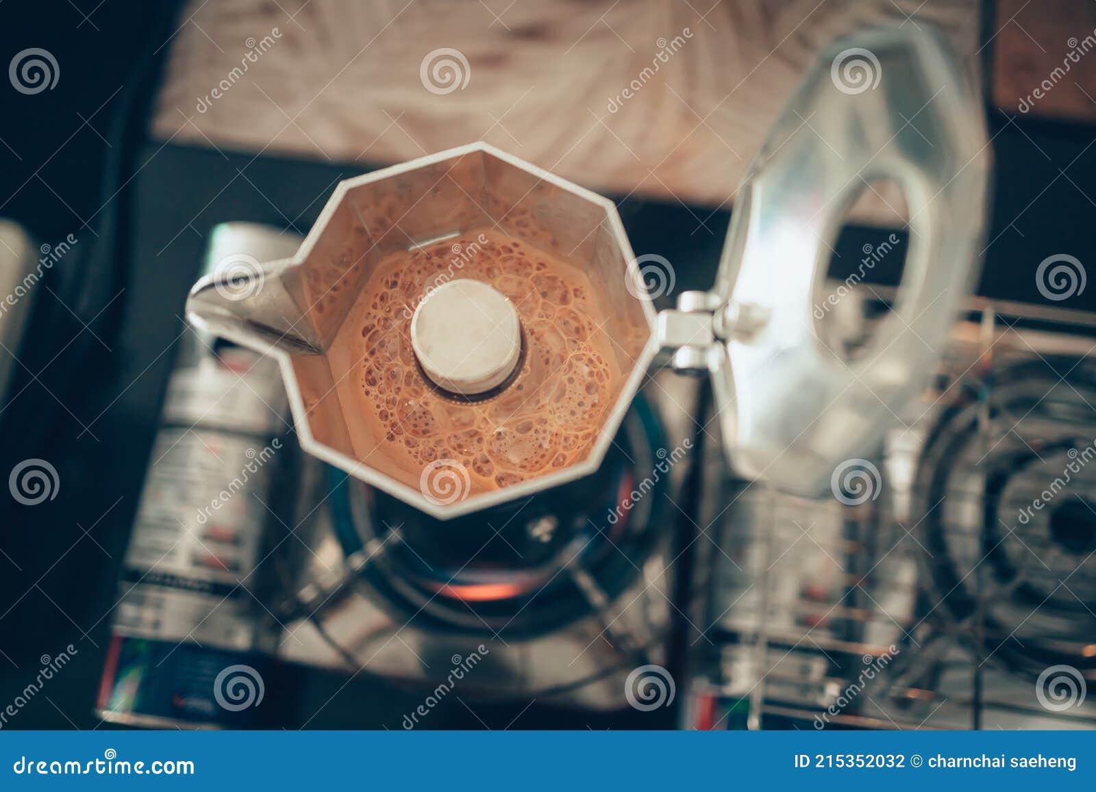 Brewing Black Moka Coffee Using Moka Coffee Maker and Boiling on Stove