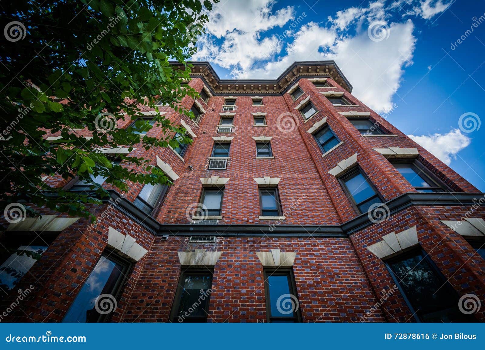 Brick Apartment Building in Adams Washington, DC. Stock Photo Image of north, clouds